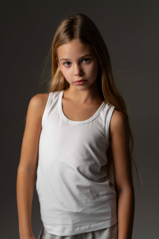 Майка дитяча із куліру, колір білий Майка дитяча із куліру, колір білий